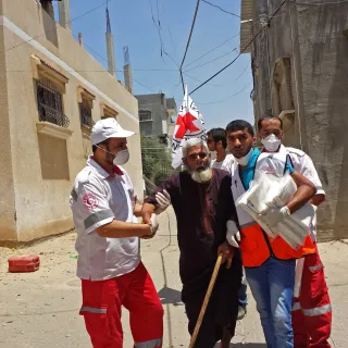 The ICRC works tirelessly with Red Cross and rec Crescent Societies to facilitate medical evacuations and provide medical supplies to hospitals in conflict zones around the world. Rama Humeid/ICRC